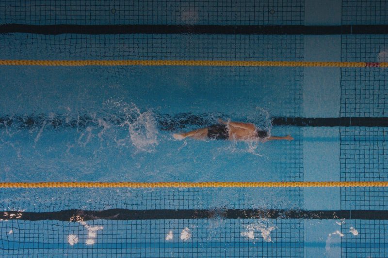 Swimmer performing laps at Colorado Athletic Club DTC at Wellbridge