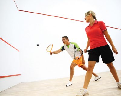 Man and Woman Playing Racquetball | Colorado Athletic Club - Flatirons