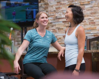 Friends Talking at a Colorado Athletic Club - Inverness Networking Event