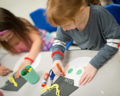 Girls Making Art at Childcare | Colorado Athletic Club - Monaco