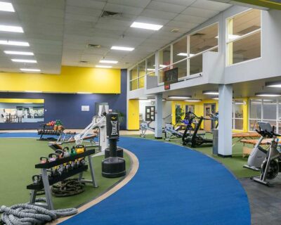 An Interior of a Wellbridge club gym featuring fitness equipment in Albuquerque, NM