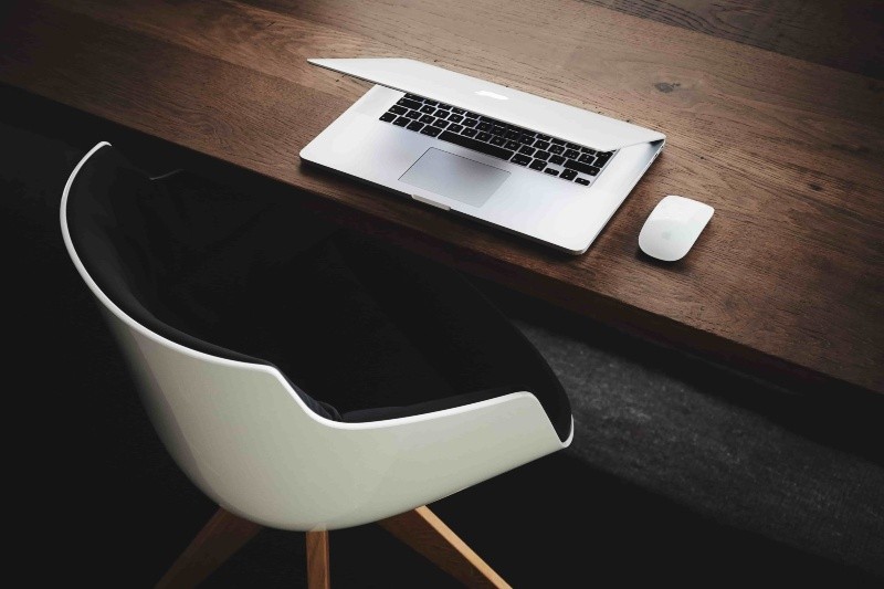 Working at a desk with a laptop