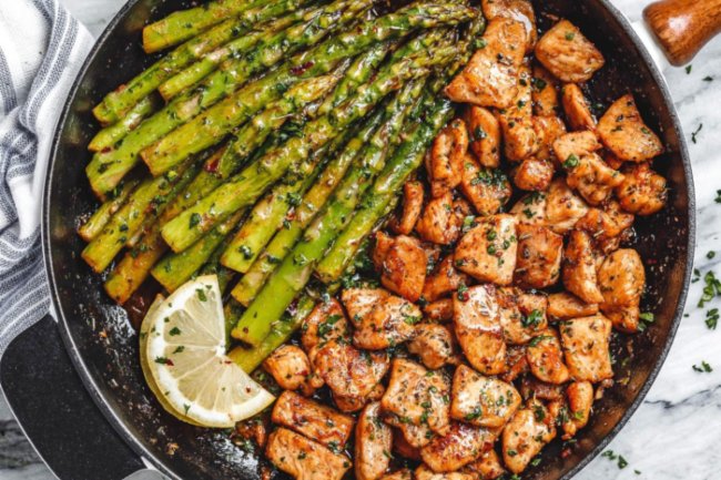 Chicken and asparagus skillet dish prepared for healthy eating at Wellbridge
