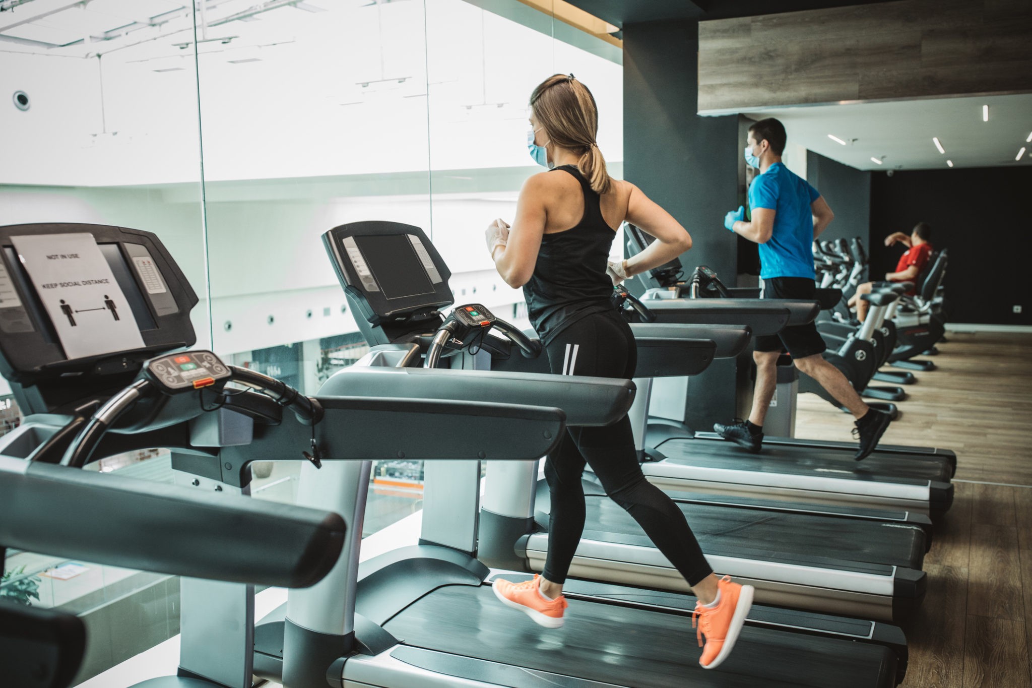 lady running on treadmill