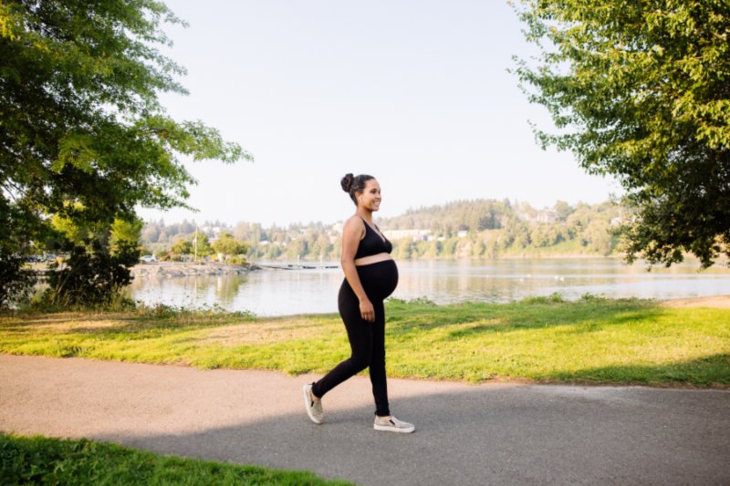 Pregnant woman working out safely