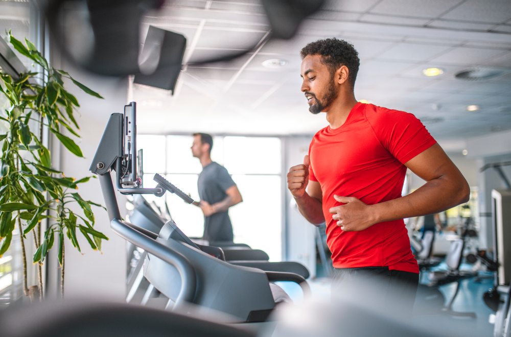 Man doing a morning workout on the treadmill.